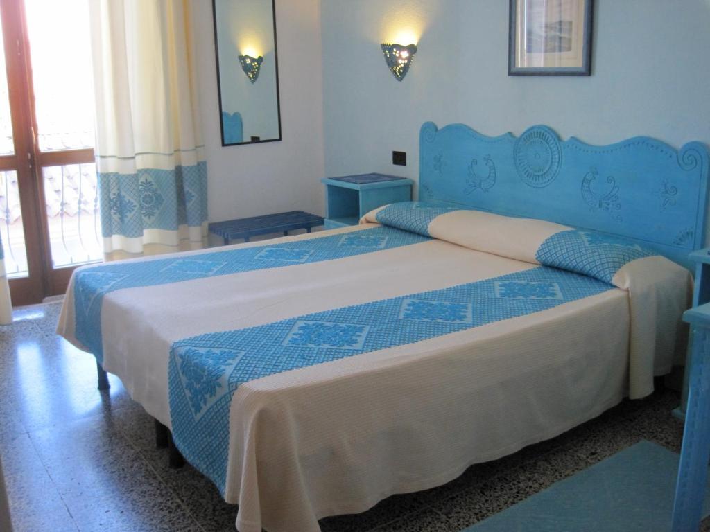 Hotel Moderno Santa Teresa Gallura Habitación foto